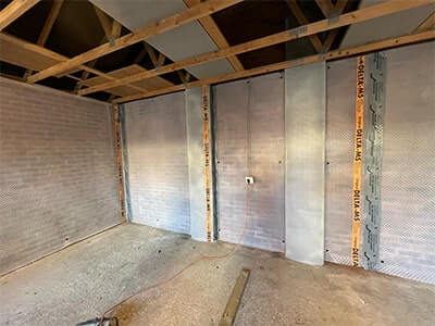 before damp treatment and insulation in garage